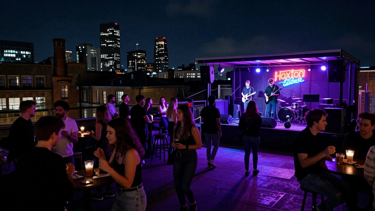 Indie band playing at Hoxton Shoreditch rooftop, vibrant crowd in cityscape.