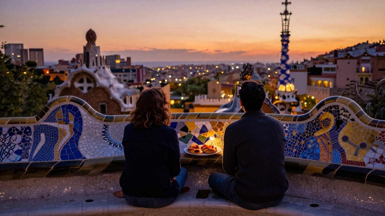 Two travelers seated together on a colorful mosaic bench in Barcelona, watching city lights at dusk.